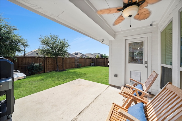 view of patio with ceiling fan