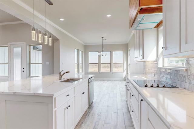 kitchen featuring decorative backsplash, ornamental molding, black electric stovetop, a sink, and exhaust hood