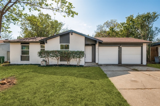 single story home featuring a front yard and a garage