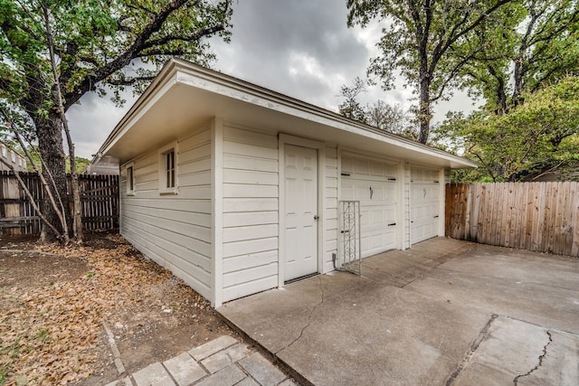 view of outbuilding with a garage