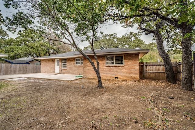 rear view of house featuring a patio area