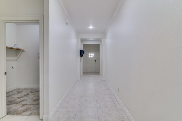 hall featuring crown molding, light tile patterned floors, recessed lighting, and baseboards
