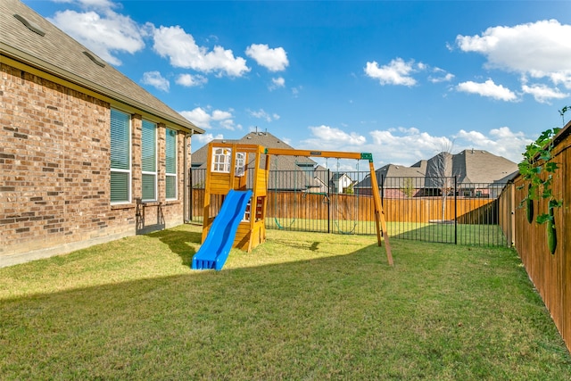 view of playground featuring a yard