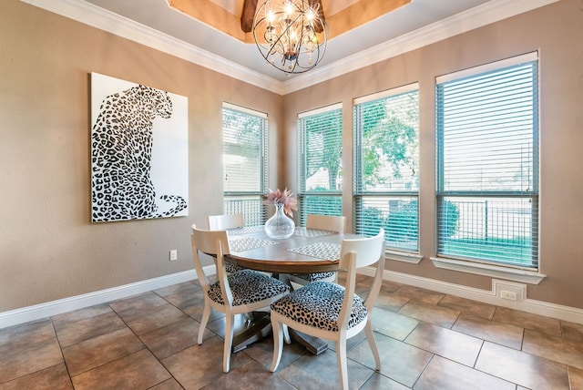 tiled dining space featuring crown molding, a raised ceiling, and a chandelier