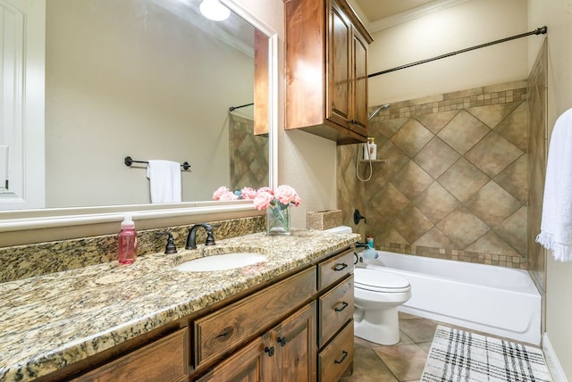 full bathroom featuring ornamental molding, toilet, vanity, tiled shower / bath combo, and tile patterned flooring