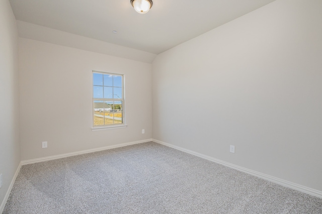 unfurnished room featuring carpet flooring