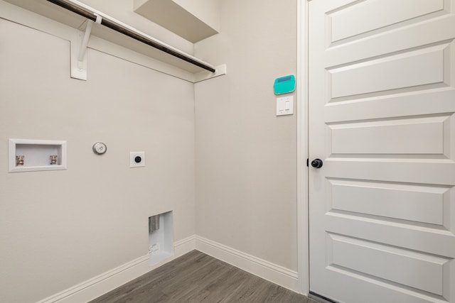 washroom featuring gas dryer hookup, hookup for an electric dryer, washer hookup, and dark hardwood / wood-style flooring