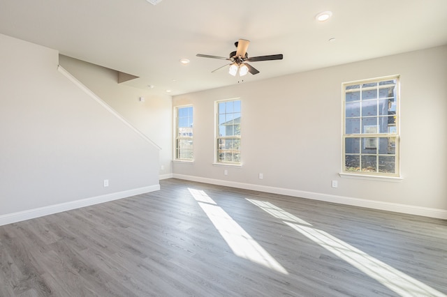 interior space featuring ceiling fan and hardwood / wood-style floors