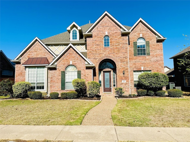 view of front property with a front lawn