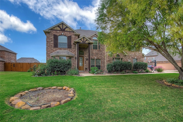 view of front of home featuring a front yard