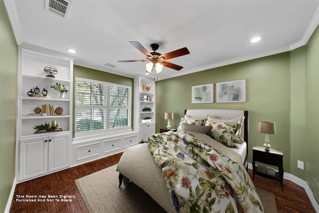 bedroom featuring ceiling fan, ornamental molding, and dark hardwood / wood-style floors