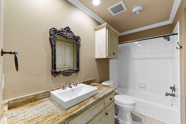 full bathroom featuring tiled shower / bath, vanity, ornamental molding, and toilet