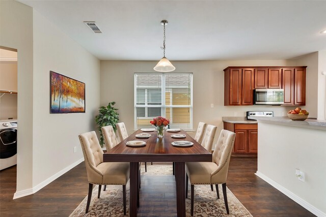 1414 Kingston Pl, Providence Village, TX 76227 - living area featuring a tile fireplace, ceiling fan, a towering ceiling, and dark wood-style floors