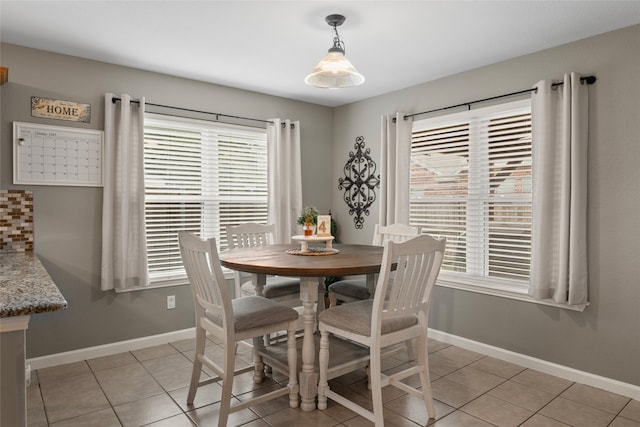 view of tiled dining space