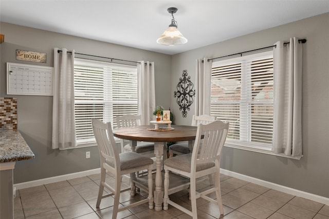628 Destin Dr, Fort Worth, TX 76131 - dining space with light tile patterned floors and baseboards