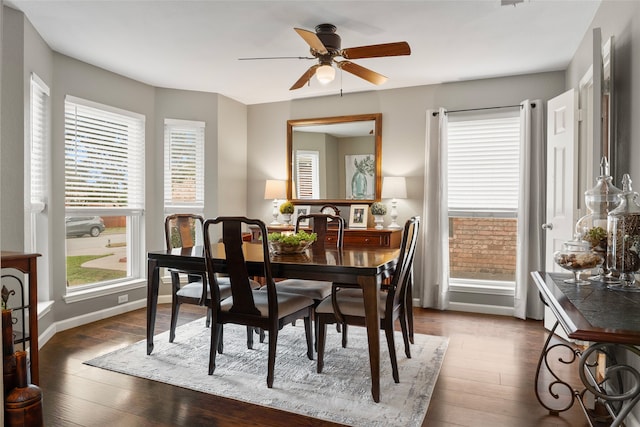 628 Destin Dr, Fort Worth, TX 76131 - dining room featuring dark wood-type flooring, a ceiling fan, and baseboards