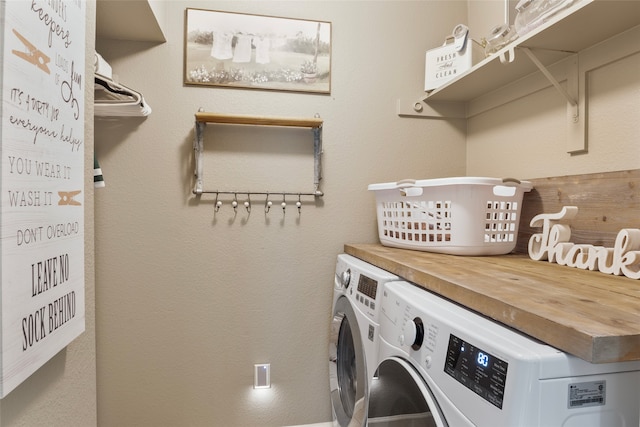 laundry room with separate washer and dryer