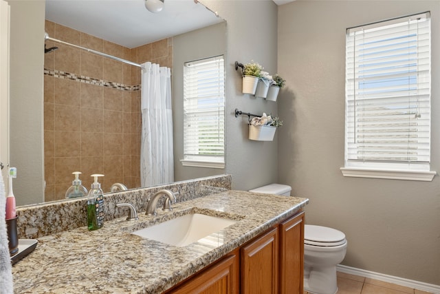 628 Destin Dr, Fort Worth, TX 76131 - full bathroom featuring toilet, tile patterned flooring, tiled shower, and vanity