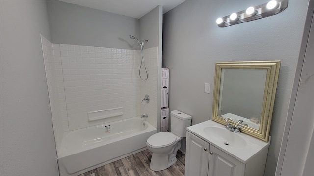 full bathroom with vanity, toilet, shower / bathing tub combination, and wood-type flooring