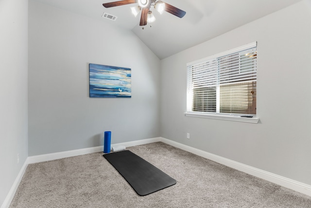 workout area with ceiling fan, vaulted ceiling, and carpet floors