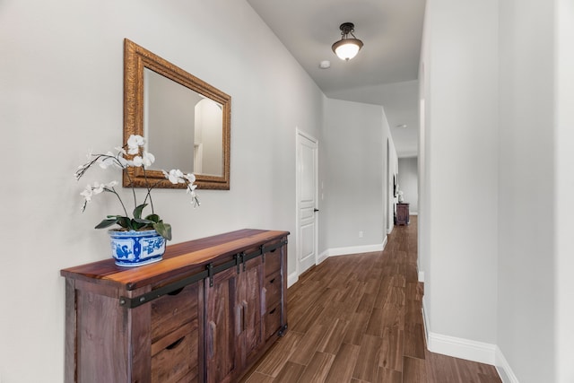 corridor featuring dark wood-type flooring