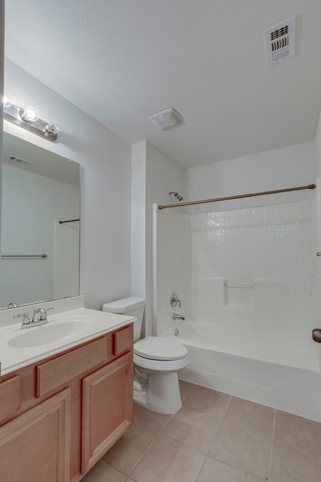 full bathroom with toilet, shower / bathing tub combination, vanity, and tile patterned floors