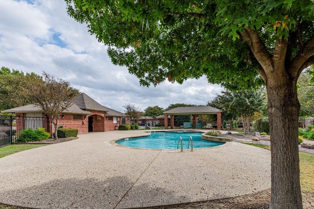 view of swimming pool featuring a patio