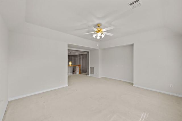 empty room with light colored carpet and ceiling fan