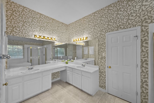 bathroom with vanity, a shower with shower door, and tile patterned flooring