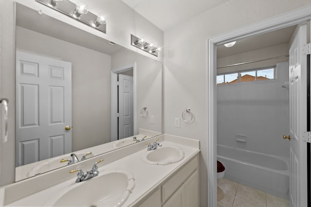 bathroom featuring shower / bath combination, vanity, and tile patterned flooring