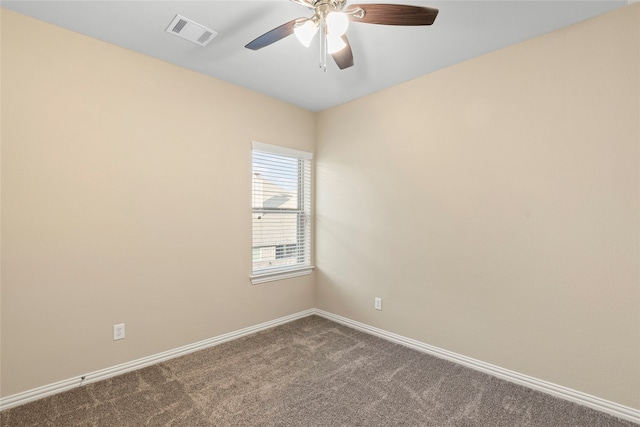 unfurnished room with ceiling fan and carpet floors