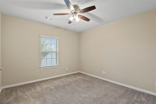 unfurnished room featuring carpet floors and ceiling fan