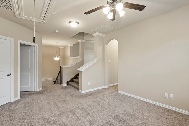 carpeted spare room with ceiling fan