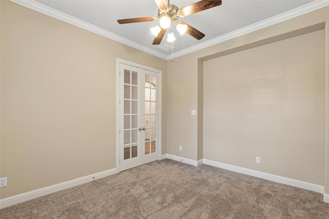 carpeted spare room with ceiling fan, french doors, and ornamental molding