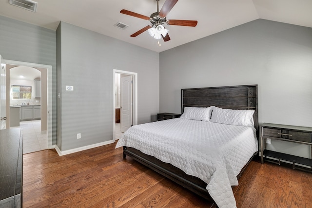 bathroom with vanity, tile patterned floors, walk in shower, and a notable chandelier