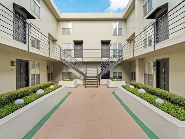 view of property's community featuring a patio area