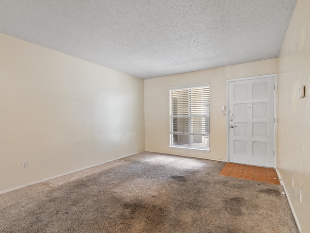 interior space with a textured ceiling