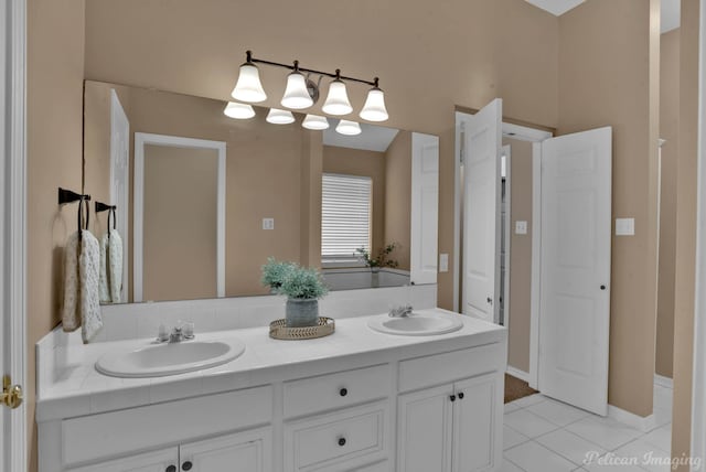 bathroom with vanity and tile patterned flooring