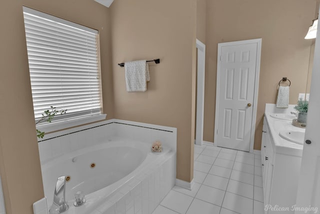 bathroom with vanity, tile patterned floors, and tiled bath