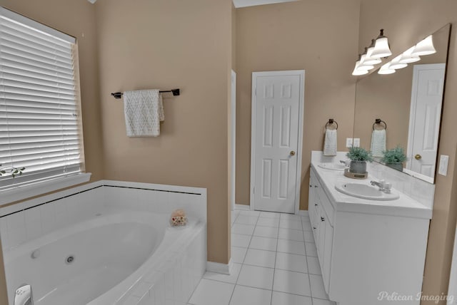 bathroom featuring vanity, tiled bath, and tile patterned floors