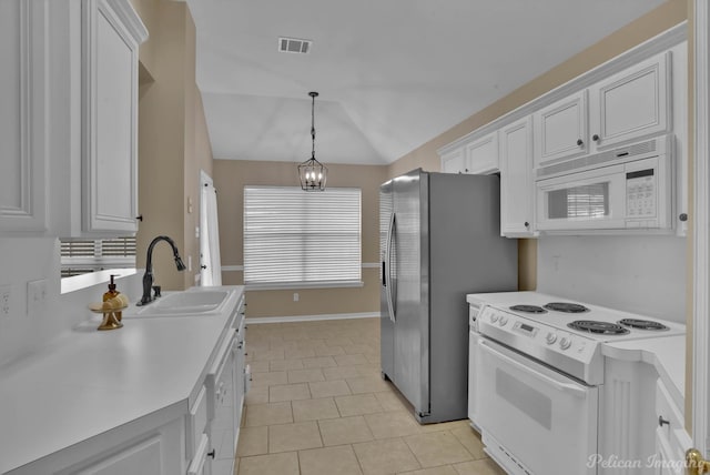 kitchen with sink, vaulted ceiling, pendant lighting, white cabinetry, and white appliances