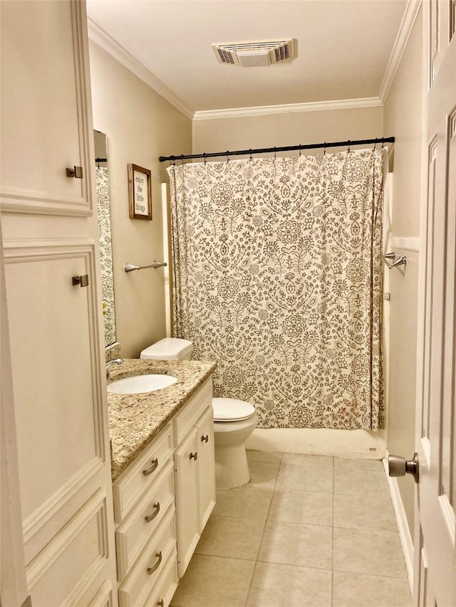 bathroom featuring vanity, tile patterned flooring, toilet, ornamental molding, and walk in shower