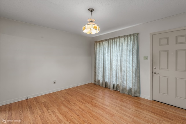 empty room featuring light hardwood / wood-style flooring