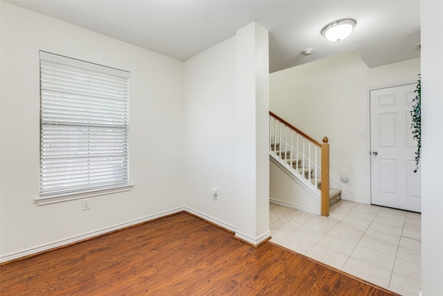 unfurnished room featuring light hardwood / wood-style floors