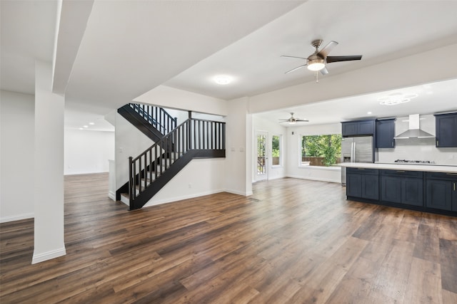 living room with dark hardwood / wood-style floors and ceiling fan