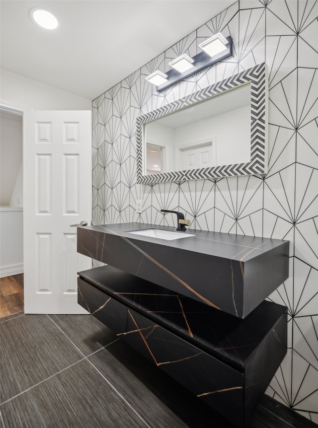 bathroom featuring vanity and hardwood / wood-style floors