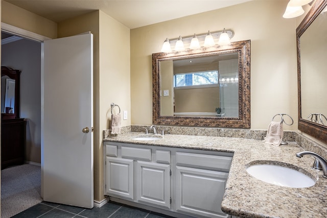 bathroom with vanity and tile patterned flooring