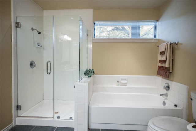 bathroom with toilet and plus walk in shower