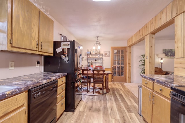 6495 Waterworks Rd, Midlothian, TX 76065 - kitchen featuring black appliances, dark countertops, light wood-style flooring, and a chandelier