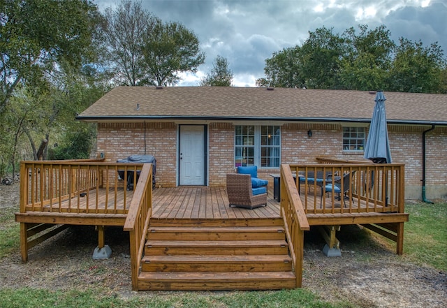 back of house with a wooden deck